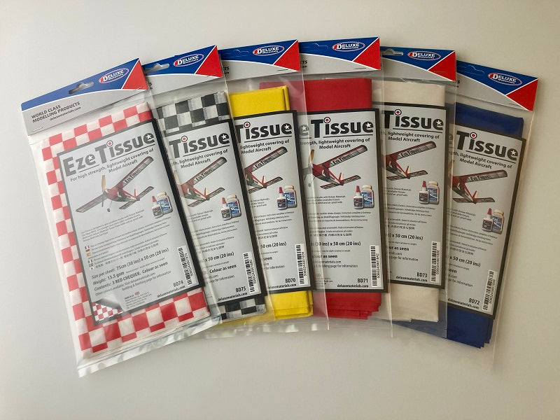 Covering balsa with tissue outlet